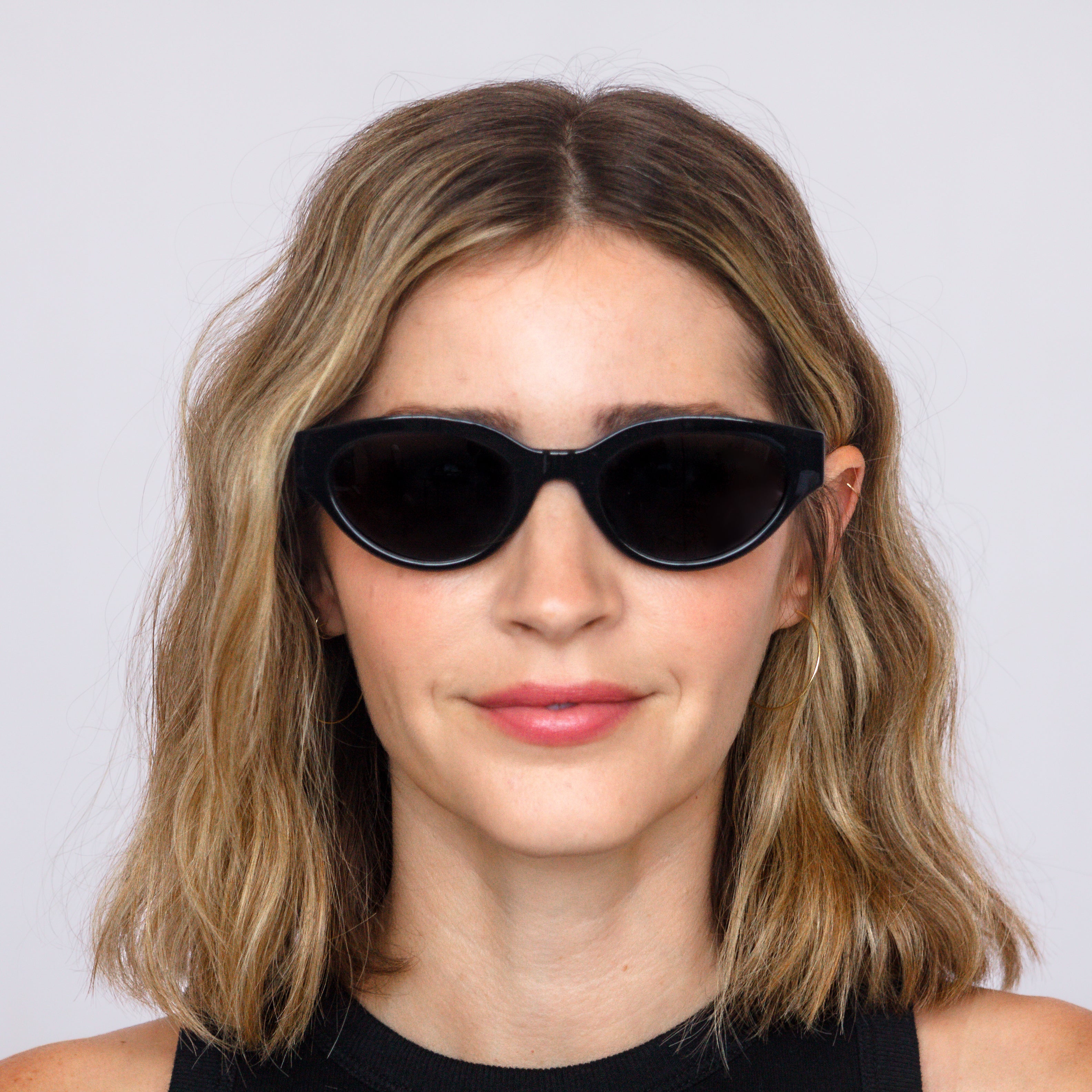 Model wearing Jaxy Monroe cat-eye sunglasses – lifestyle photo