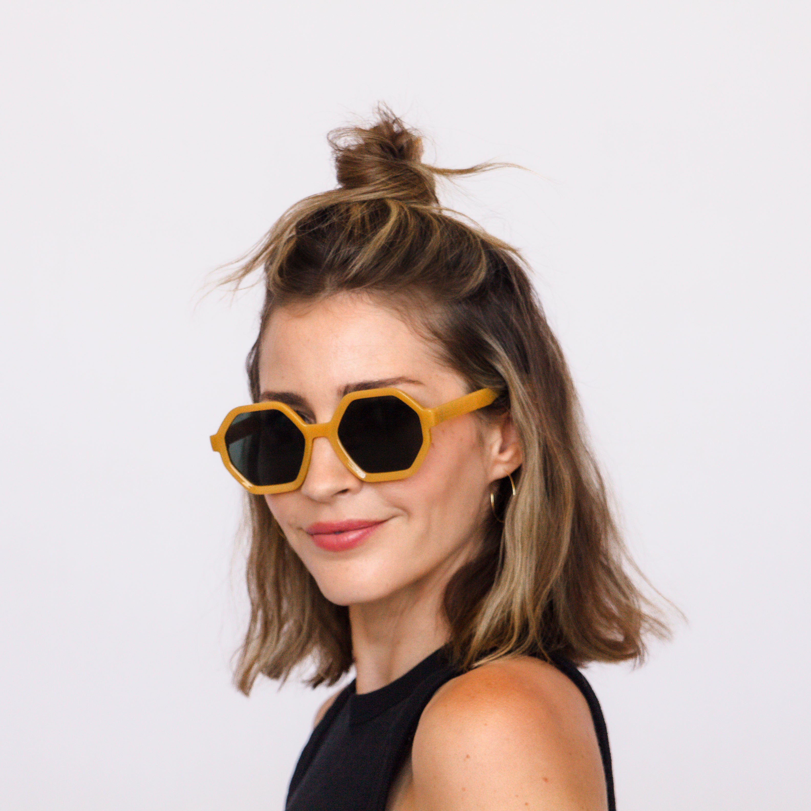 A model in Jaxy The Hex geometric sunglasses, lifestyle shot