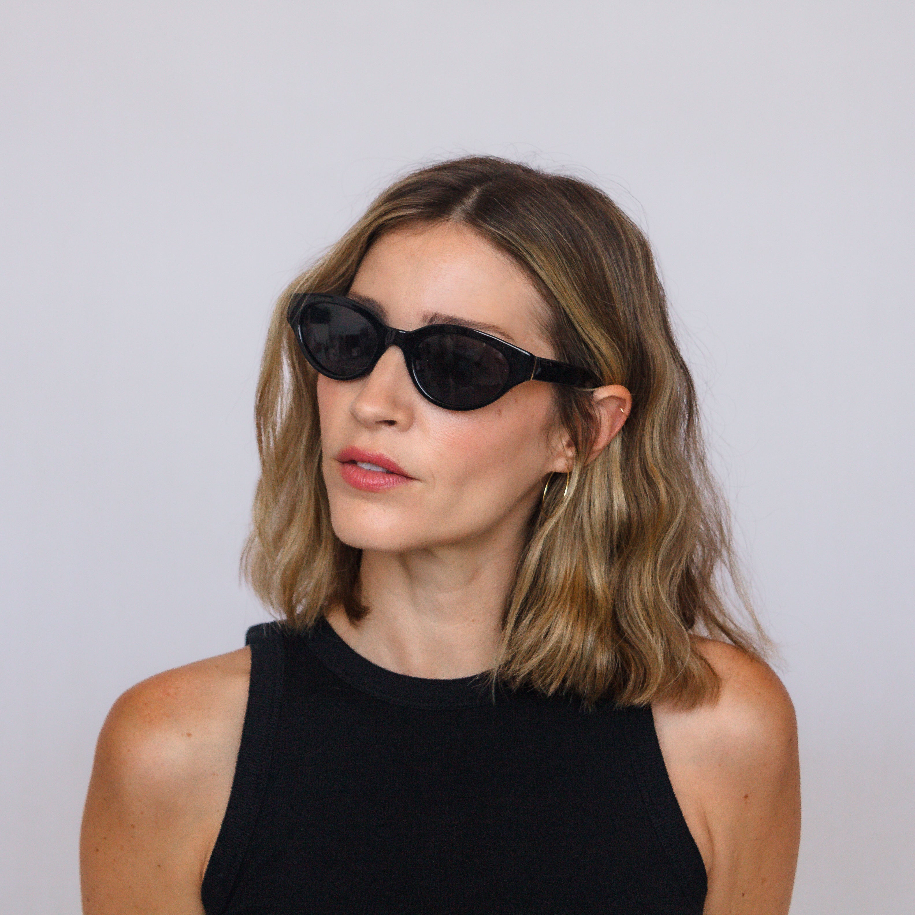 Jaxy Eyewear Monroe – cat-eye sunglasses worn by a model