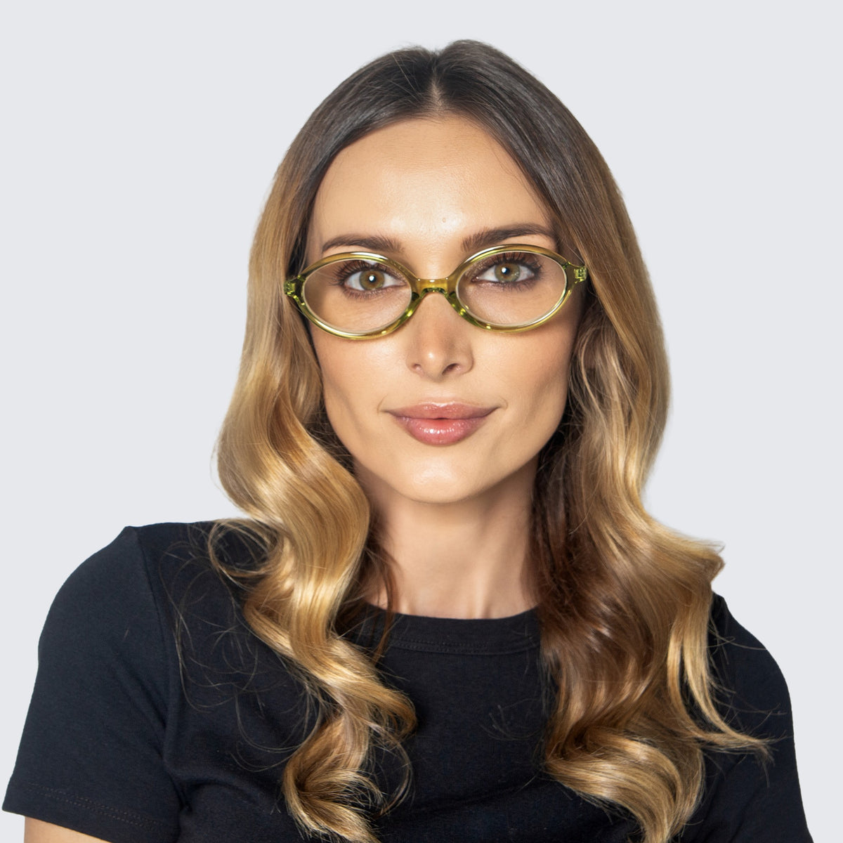 Jaxy Wisp Blue Light Glasses Oval sunglasses — worn view #Color_Green / Blue Light