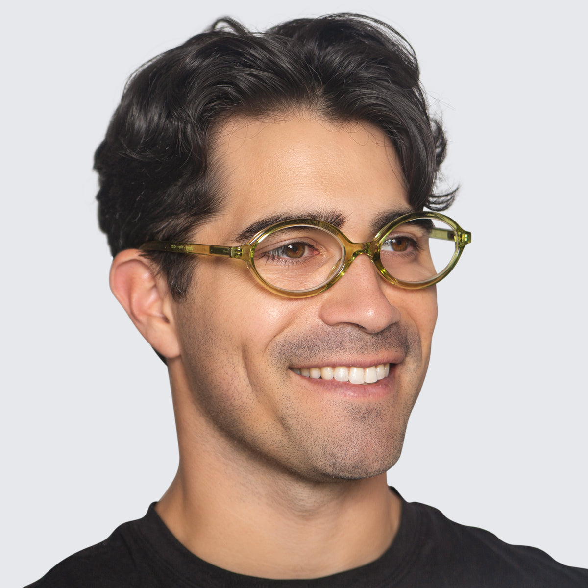 Jaxy Wisp Oval sunglasses — worn view #Color_Green