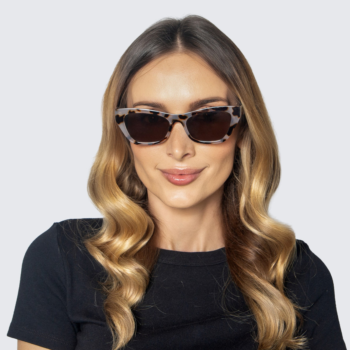 Jaxy Spritz Cat-eye sunglasses — worn view #Color_Tortoise