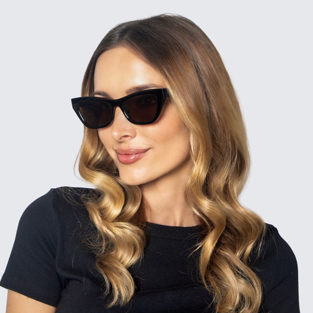 Jaxy Spritz Cat-eye sunglasses — worn view #Color_Black