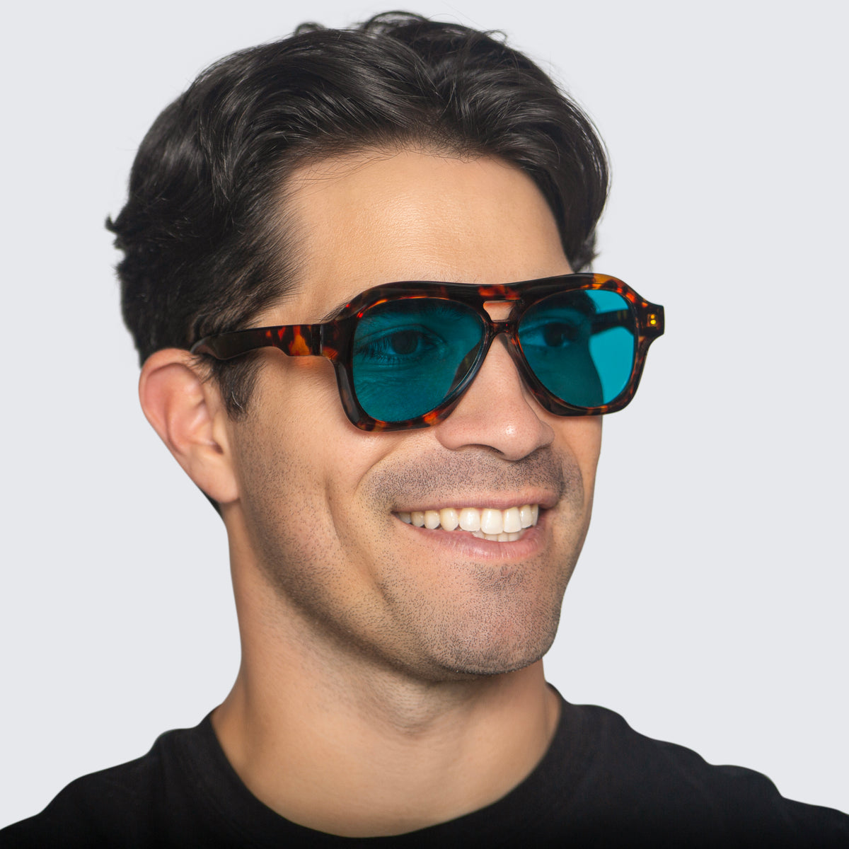Jaxy Burnout Aviator sunglasses — worn view #Color_Tort/Teal