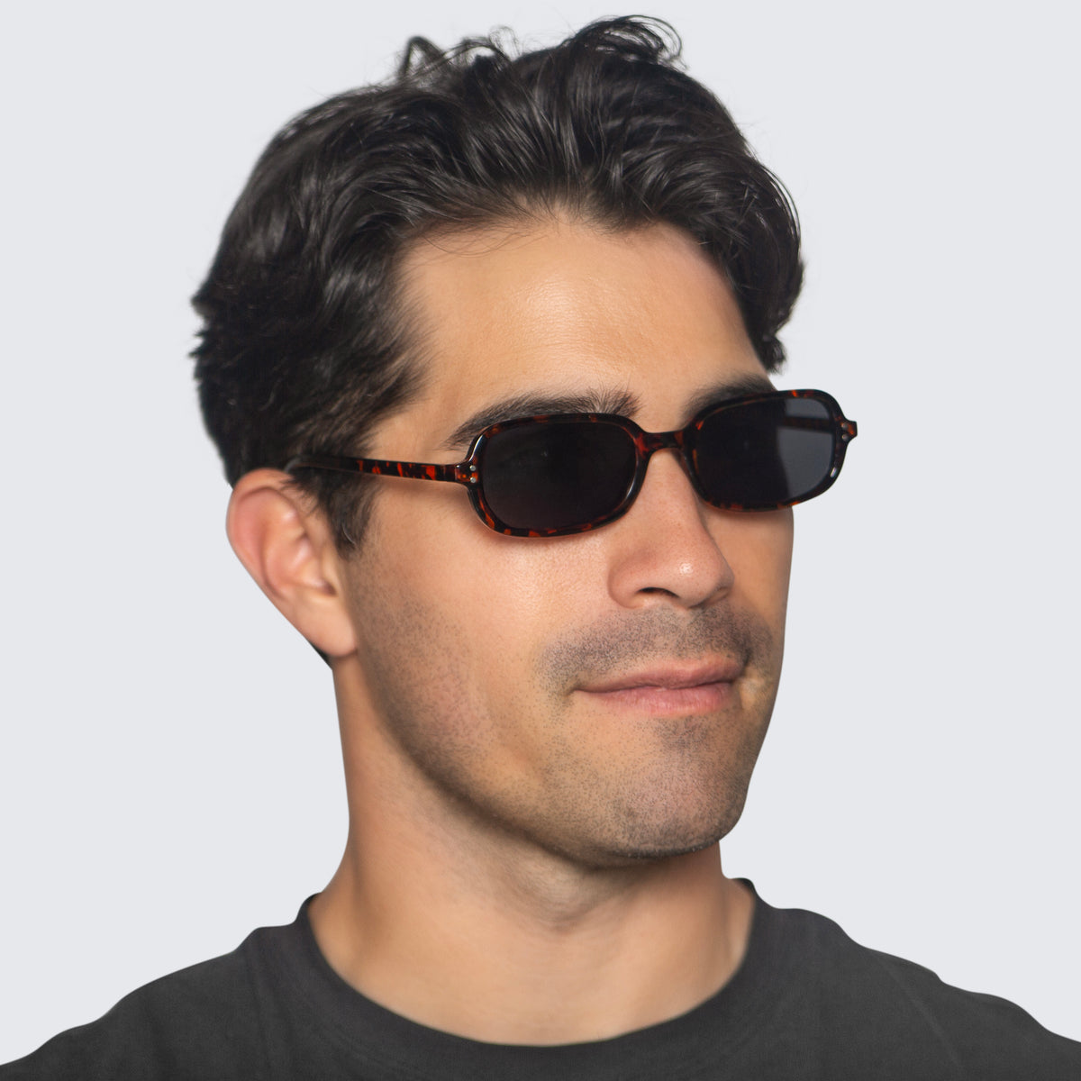 Jaxy Palm State Rectangle sunglasses — worn view #Color_Tortoise