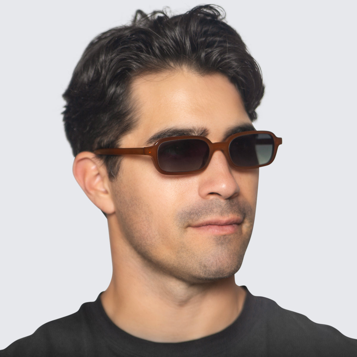 Jaxy Palm State Rectangle sunglasses — worn view #Color_Brown