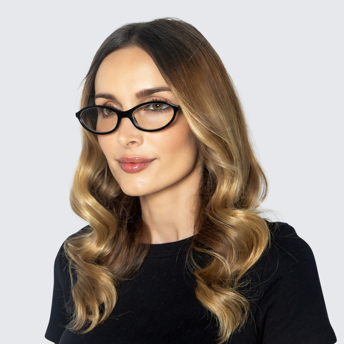Jaxy Slip Blue Light Glasses Oval sunglasses — worn view #Color_Black / Blue Light