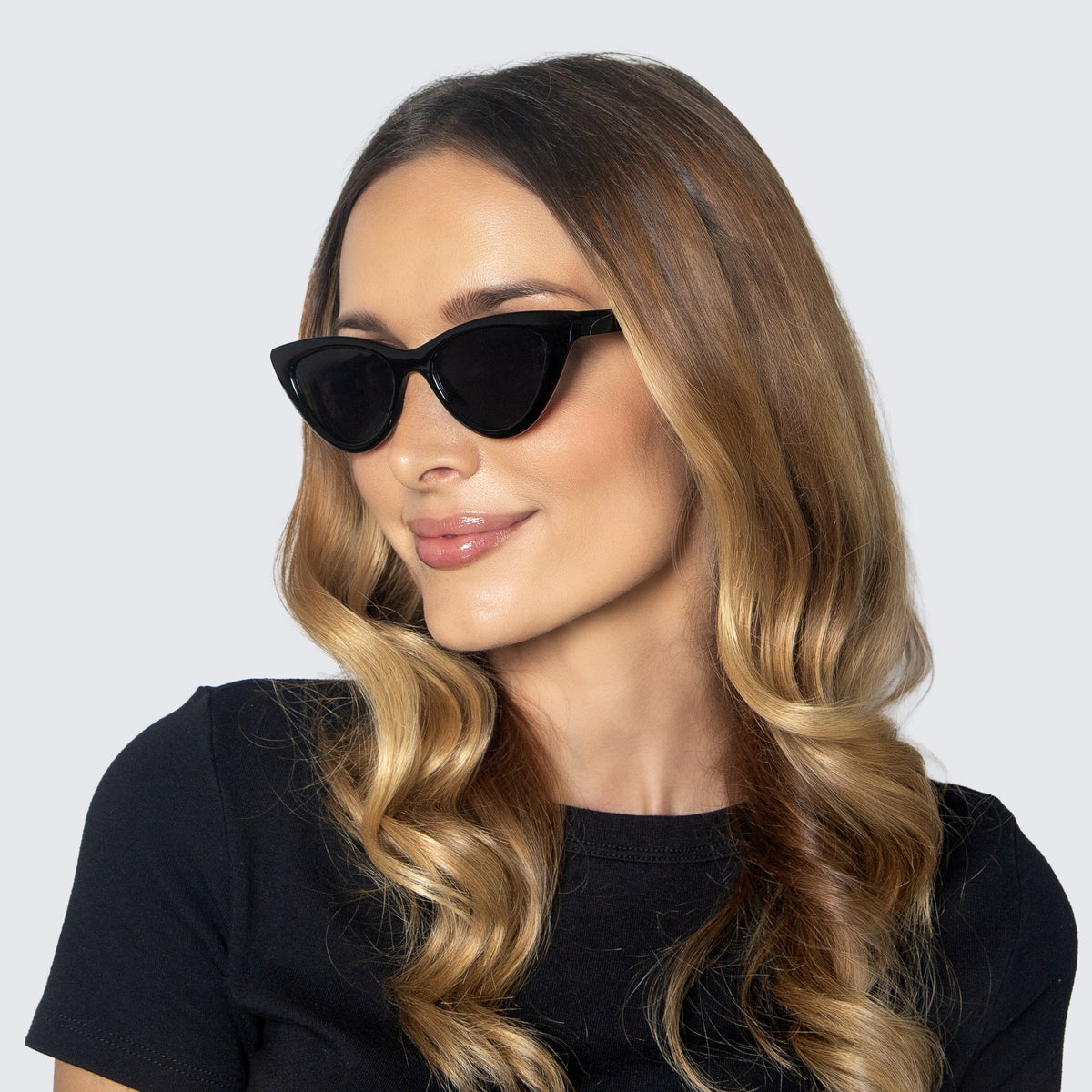 Jaxy Vamp Cat-eye sunglasses — worn view #Color_Black