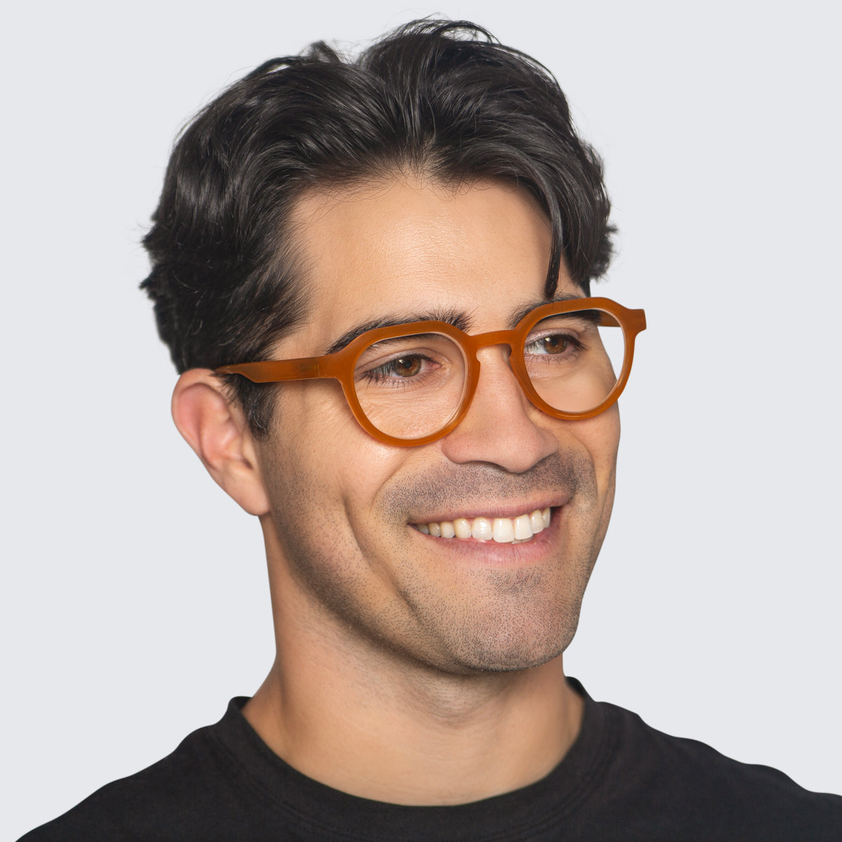 Jaxy Tonic Round sunglasses — worn view #Color_Amber