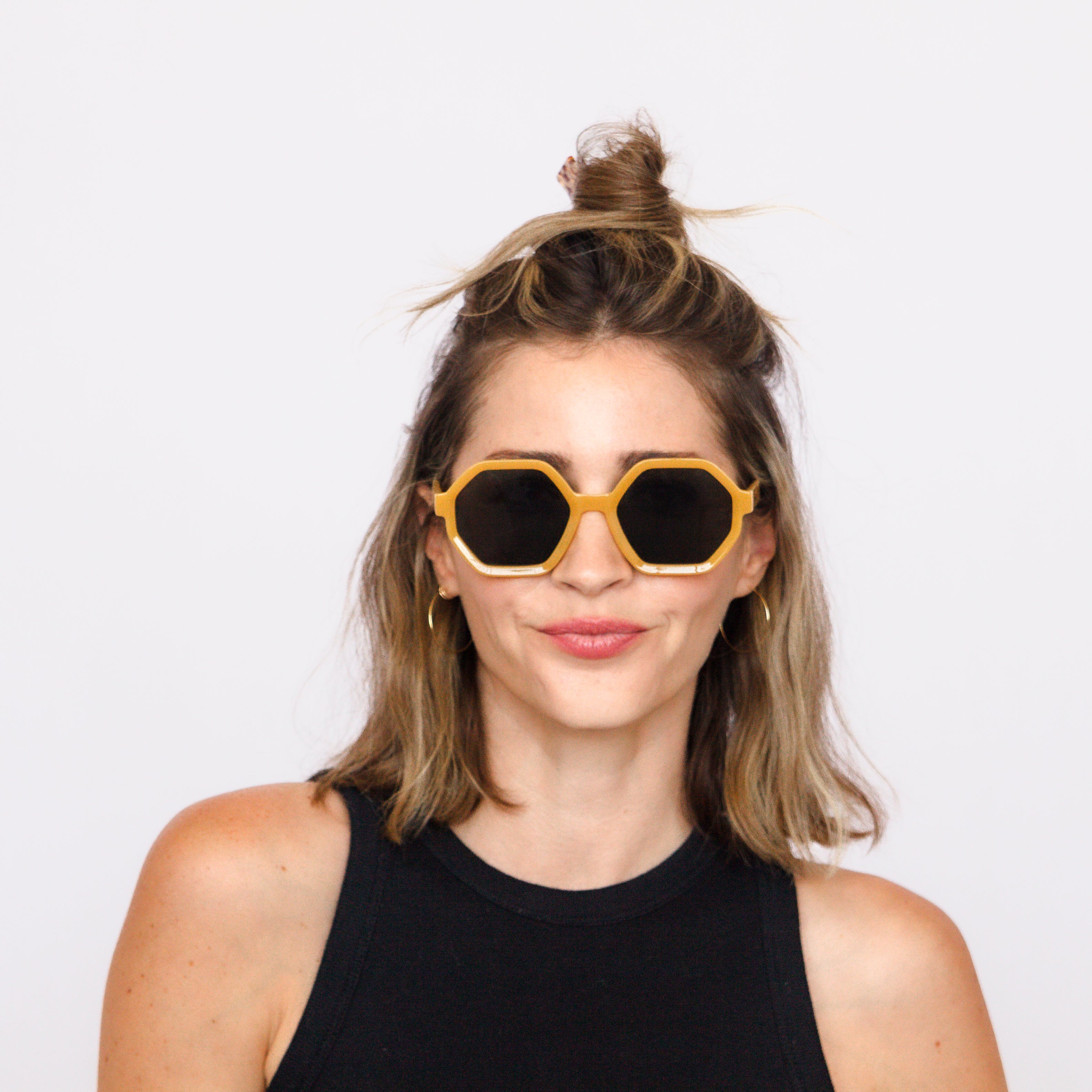 Jaxy Eyewear The Hex – geometric sunglasses worn by a model