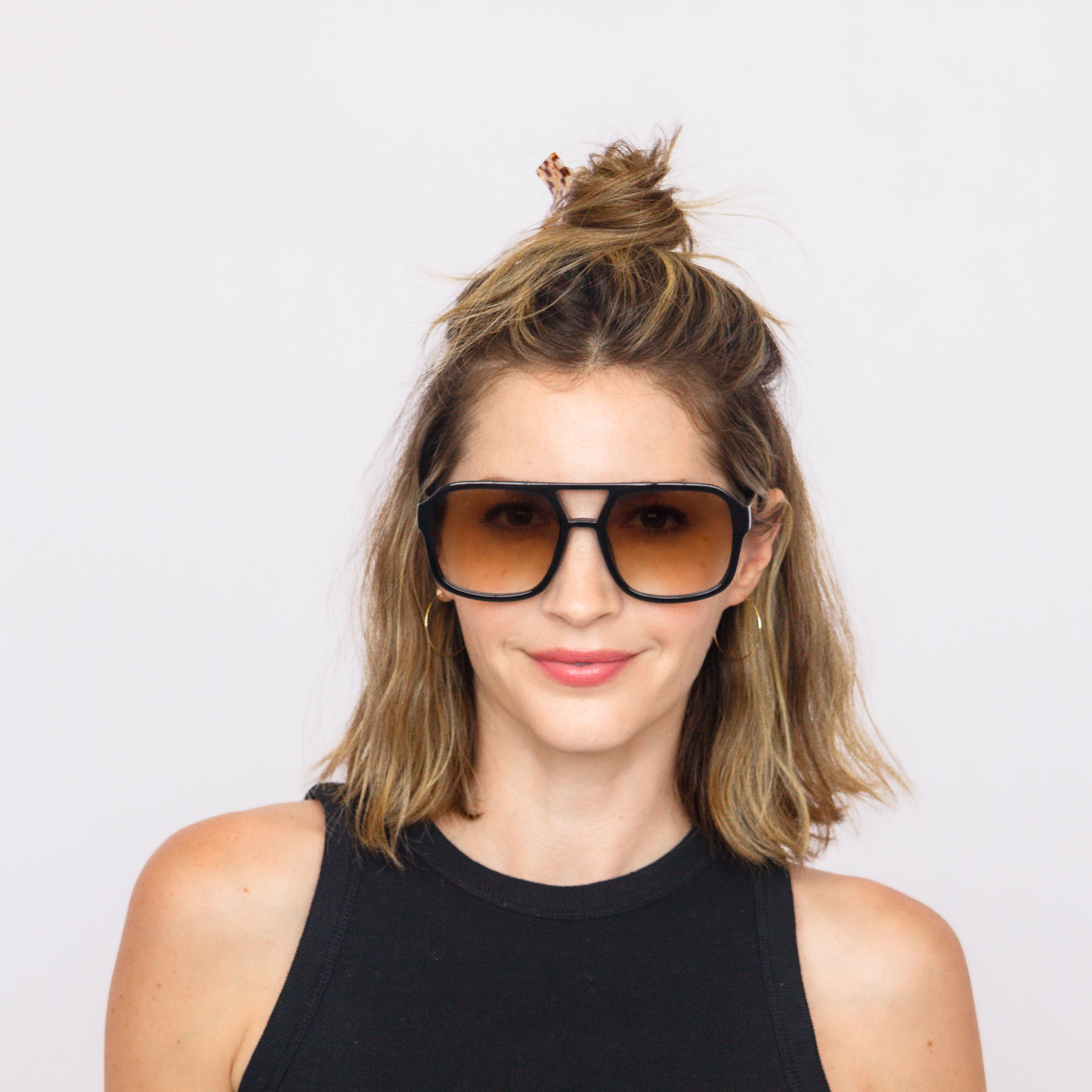 Model wearing Jaxy Diplomat square sunglasses – lifestyle photo
