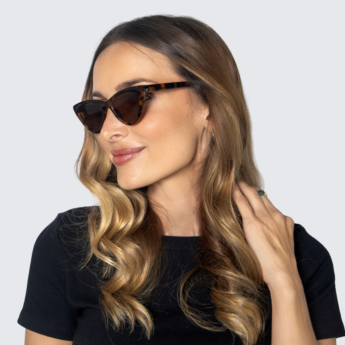 Jaxy Vamp Cat-eye sunglasses — worn view #Color_Tortoise