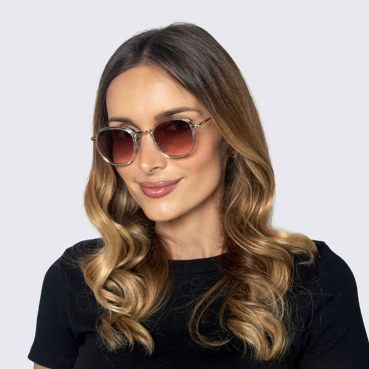 Jaxy Latitude Round sunglasses — worn view #Color_Crystal