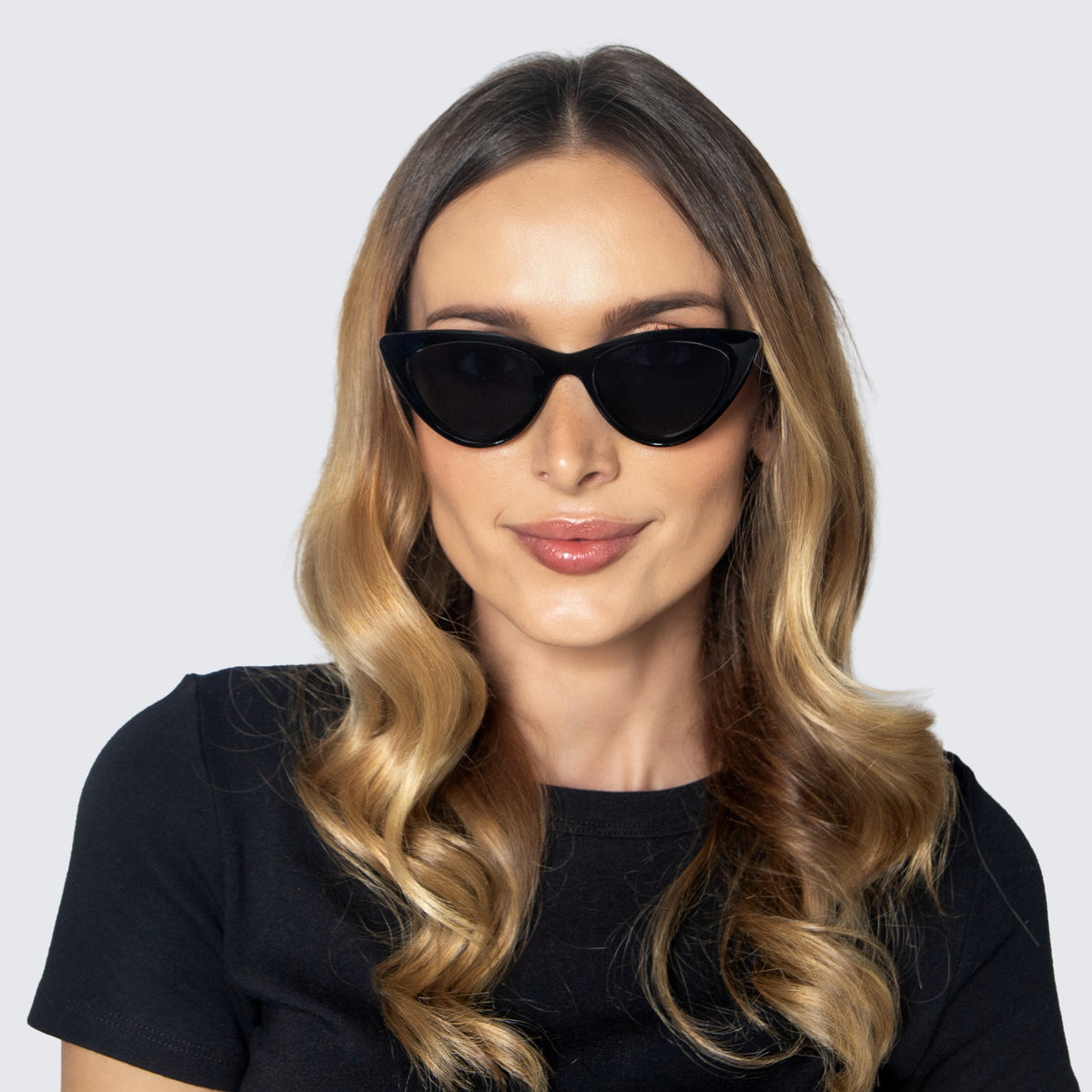 Jaxy Vamp Cat-eye sunglasses — worn view #Color_Black